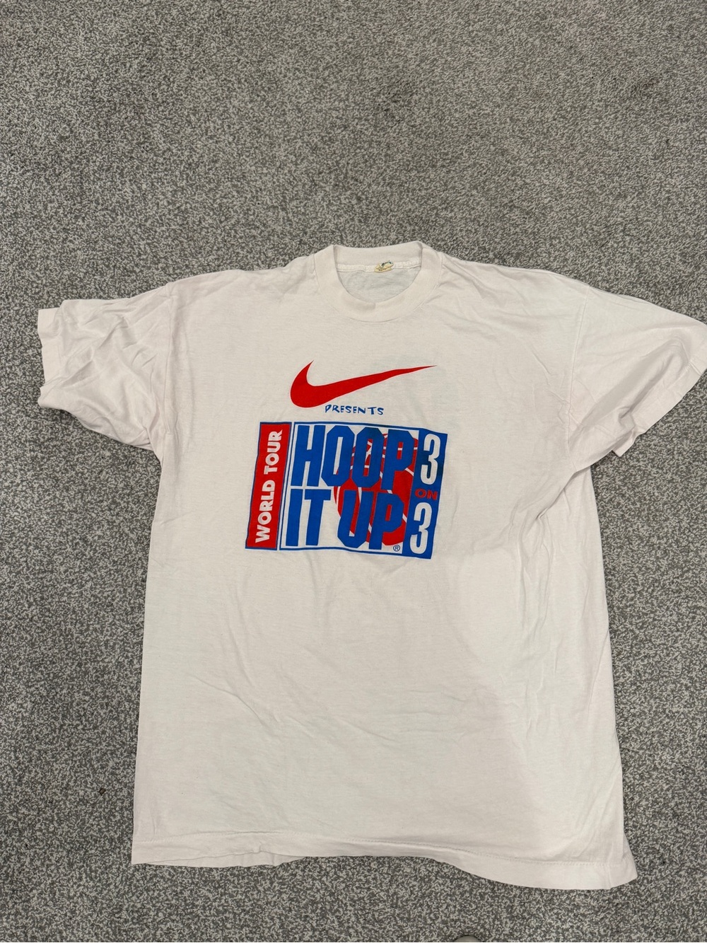 Nike White Graphic Tee with Red Swoosh and Blue/Red Hoop It Up Print